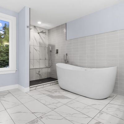 white bathroom with white freestanding tub