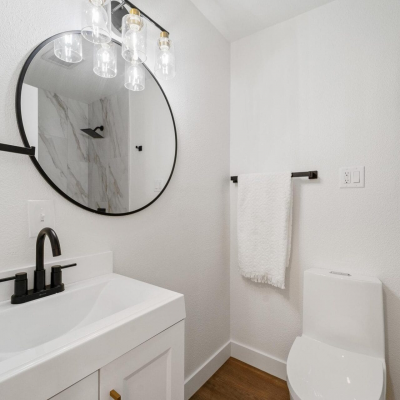white sink and toilet in bathroom